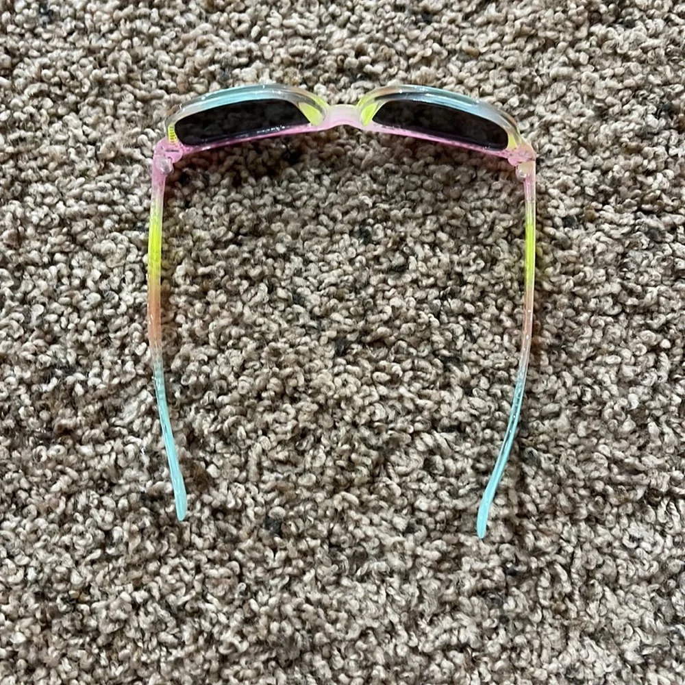 2 pair kids sunglasses and 1 case.